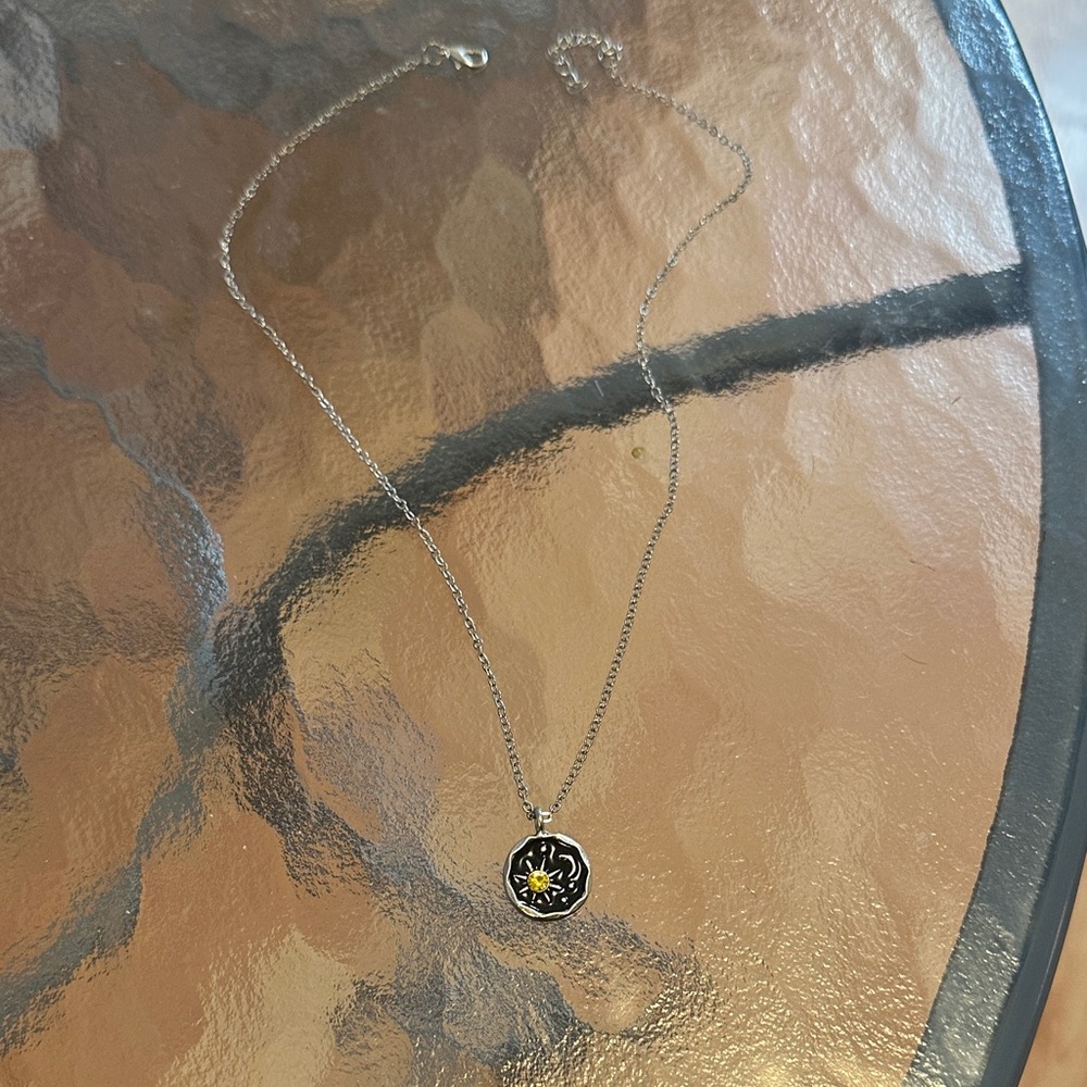 Elegant Silver and Black Floral Necklace